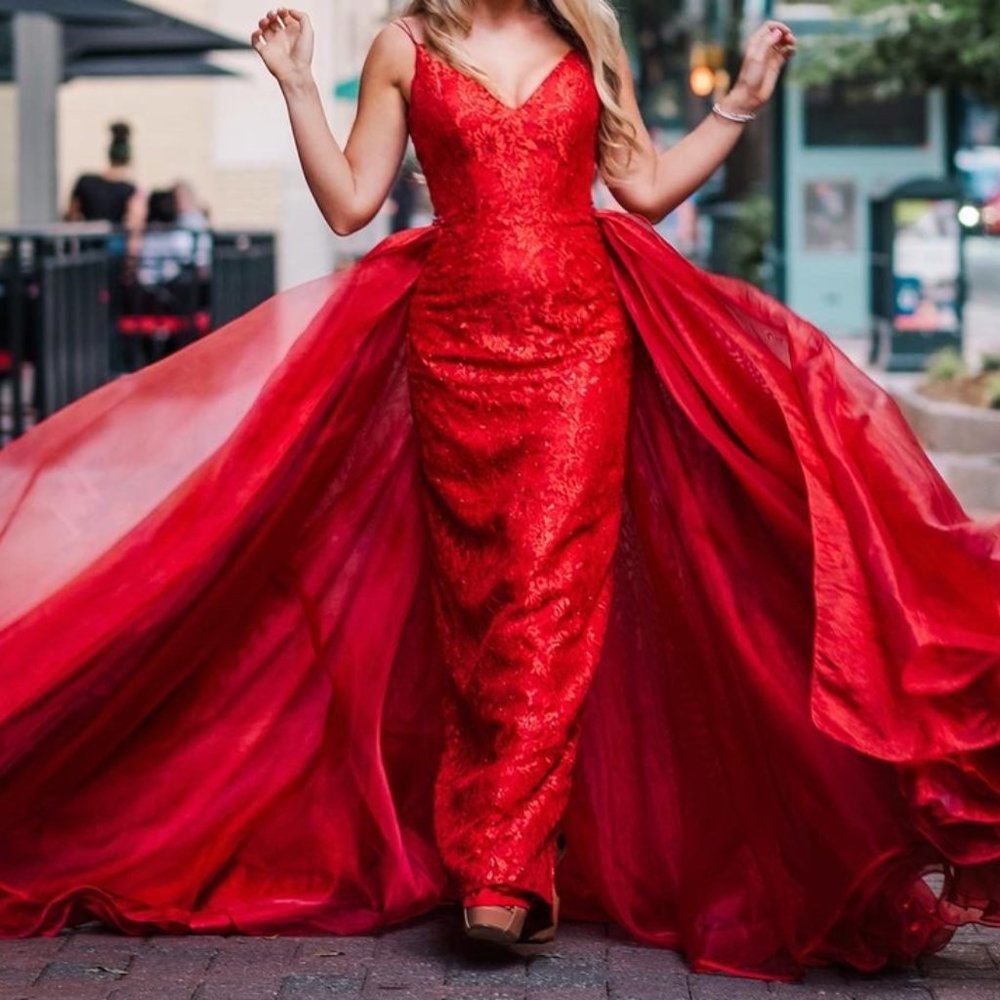 Award-winning Sherri Hill red gown with overskirt